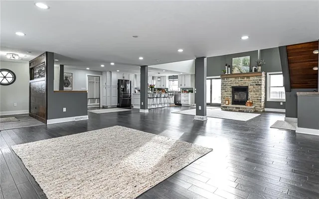a view of kitchen with cabinets and wooden floor