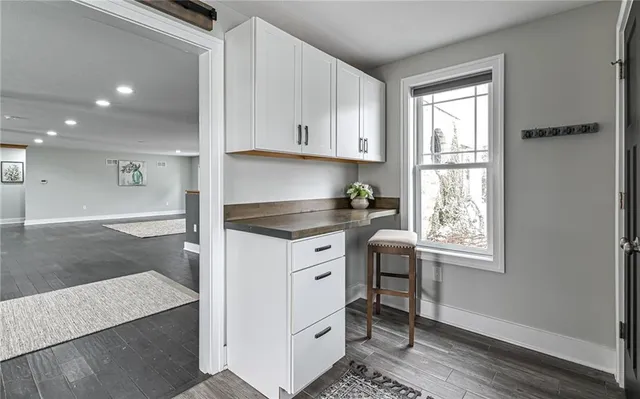 a view of livingroom with furniture and wooden floor