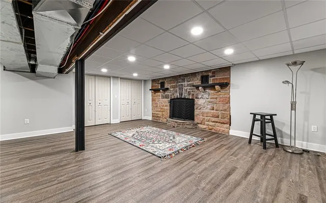 a view of balcony with wooden floor and outdoor seating