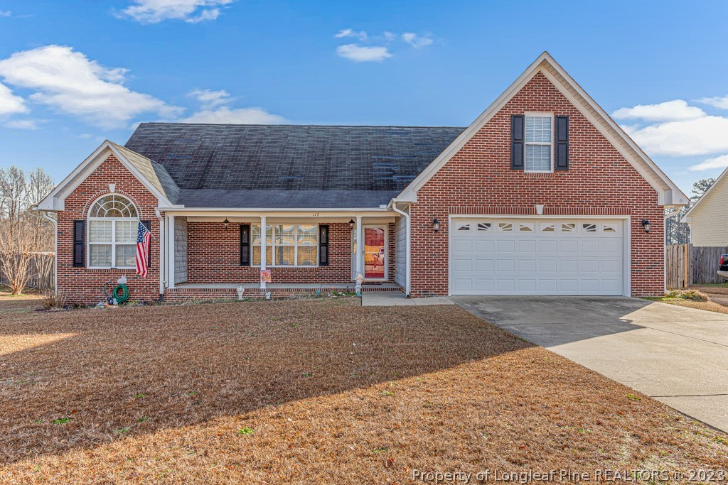 117 Ridgeview Drive Raeford, NC 28376 - Photo 1 of 31 a front view of a house with a yard