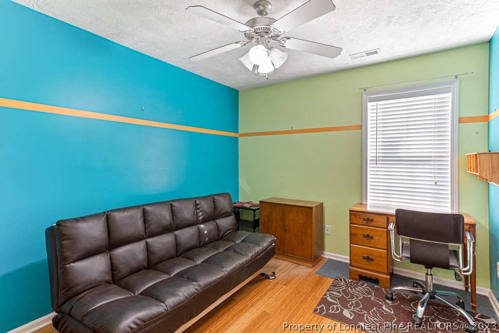 117 Ridgeview Drive Raeford, NC 28376 - Photo 21 of 31 a living room with furniture and a window