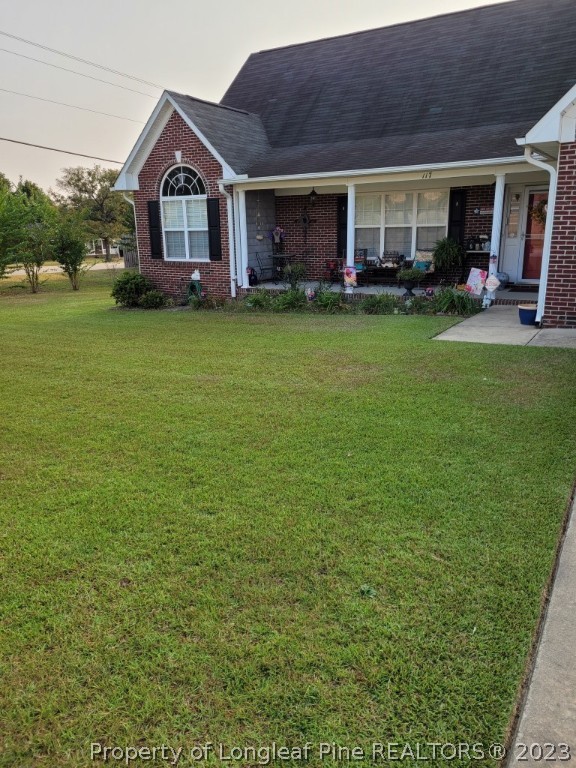 117 Ridgeview Drive Raeford, NC 28376 - Photo 4 of 31 a view of a yard in front of house