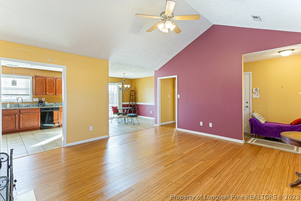 117 Ridgeview Drive Raeford, NC 28376 - Photo 10 of 31 a view of livingroom with hardwood floor and a ceiling fan