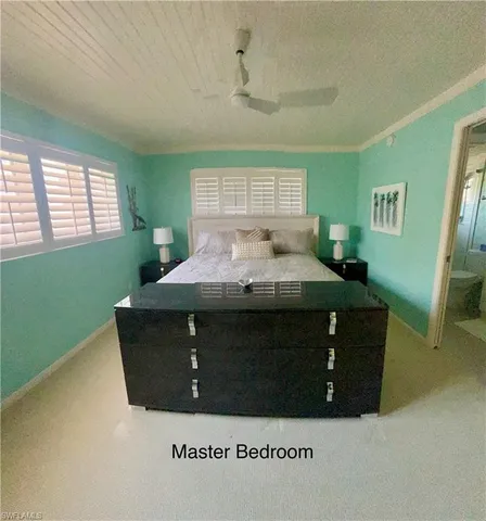 a room with a bed and a window