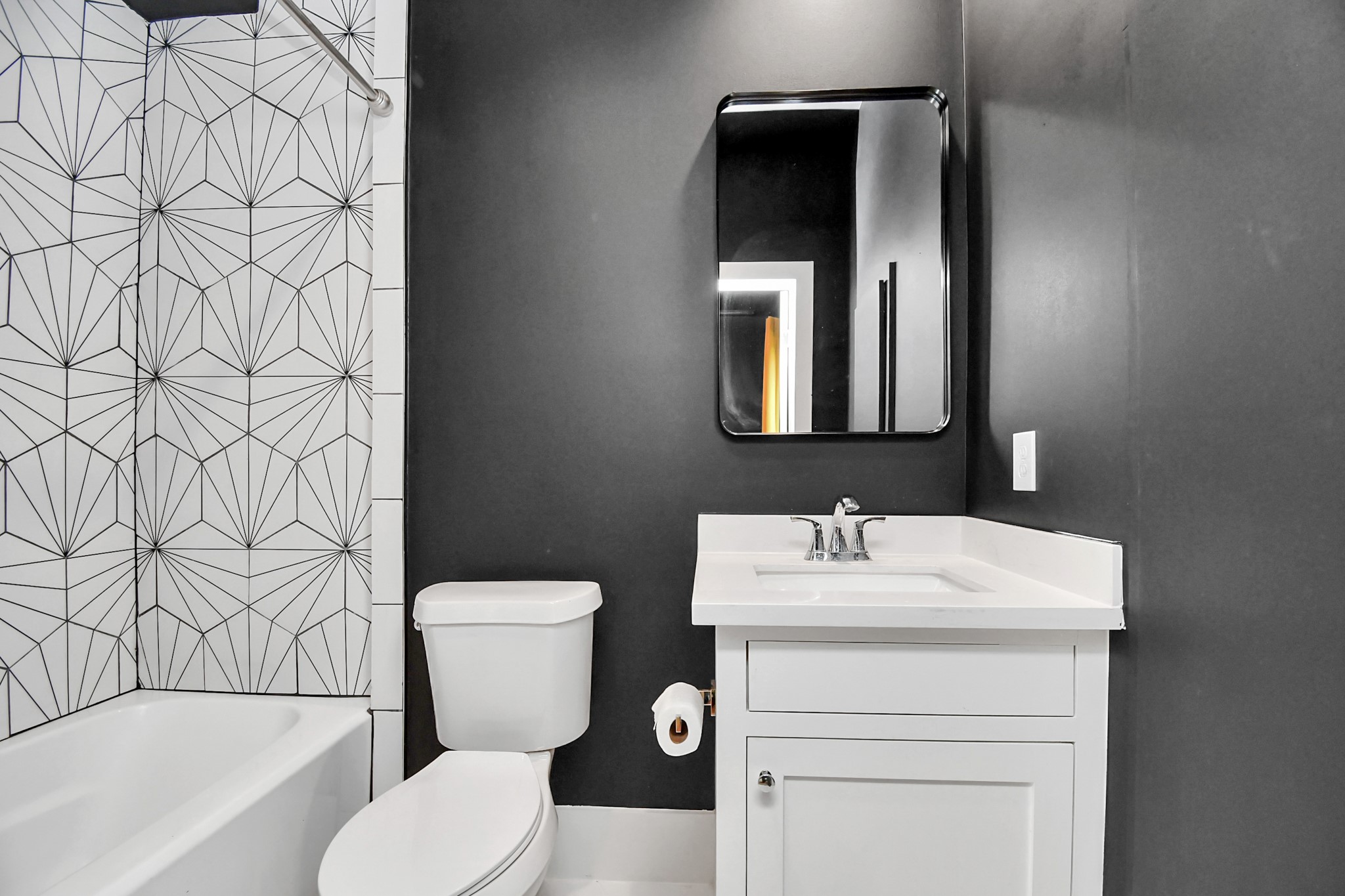 2303 Yupon Street Houston, TX 77006 - Photo 12 of 48 a bathroom with a toilet sink and mirror