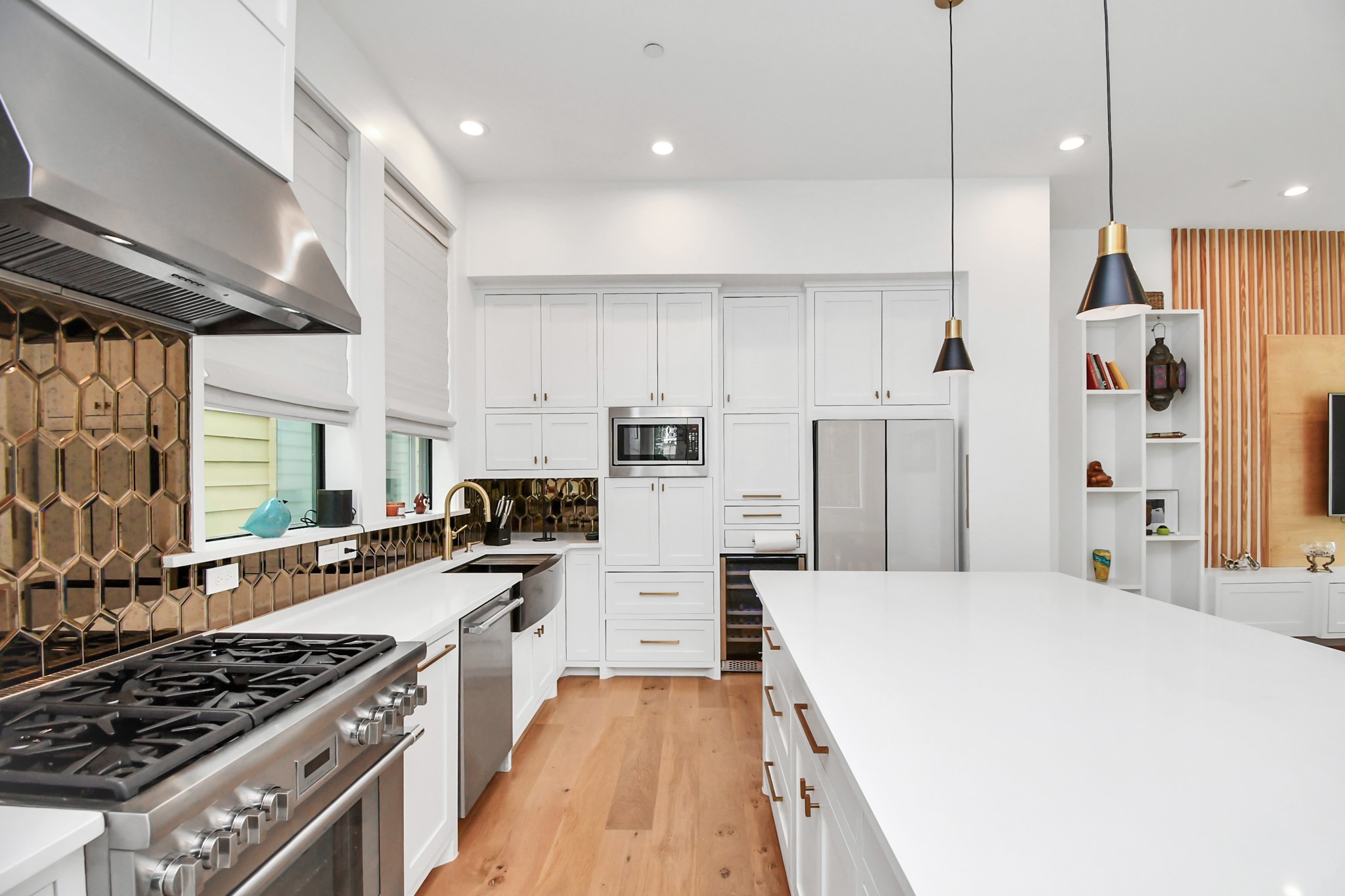 2303 Yupon Street Houston, TX 77006 - Photo 22 of 48 a kitchen with stainless steel appliances a stove a sink a refrigerator and a oven