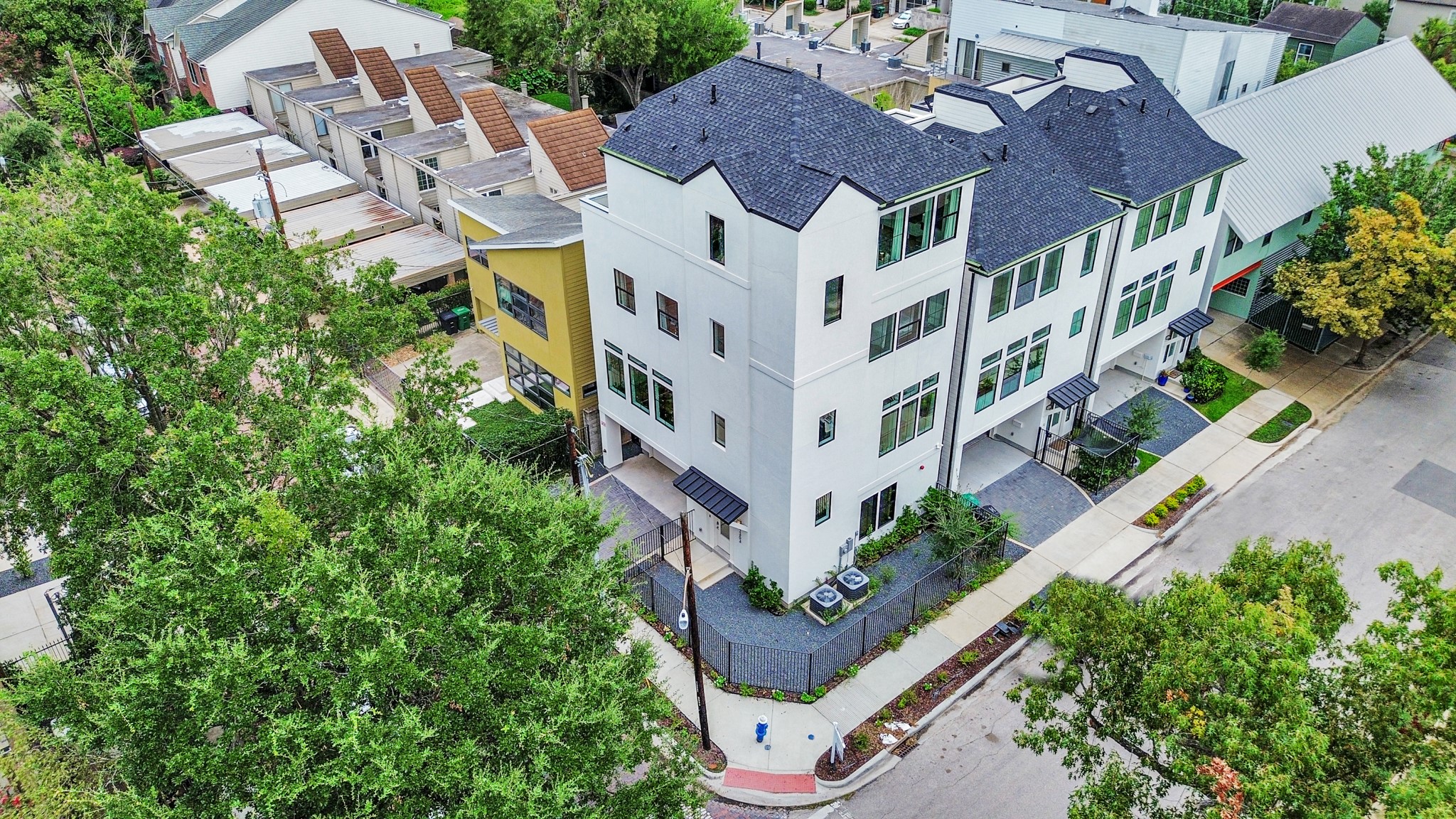 2303 Yupon Street Houston, TX 77006 - Photo 3 of 48 an aerial view of multiple houses with a yard