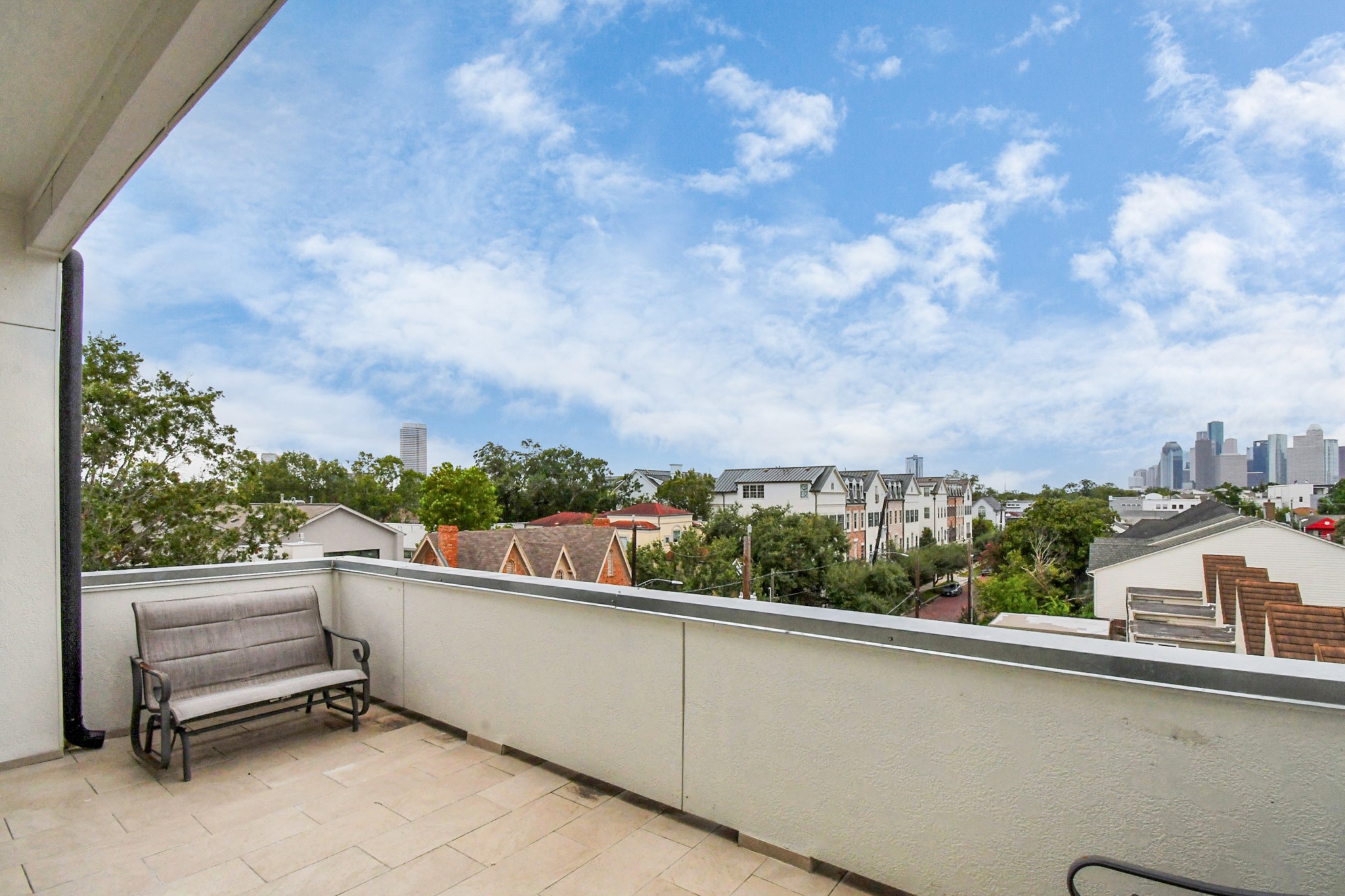 2303 Yupon Street Houston, TX 77006 - Photo 6 of 48 a view of a terrace with skyline