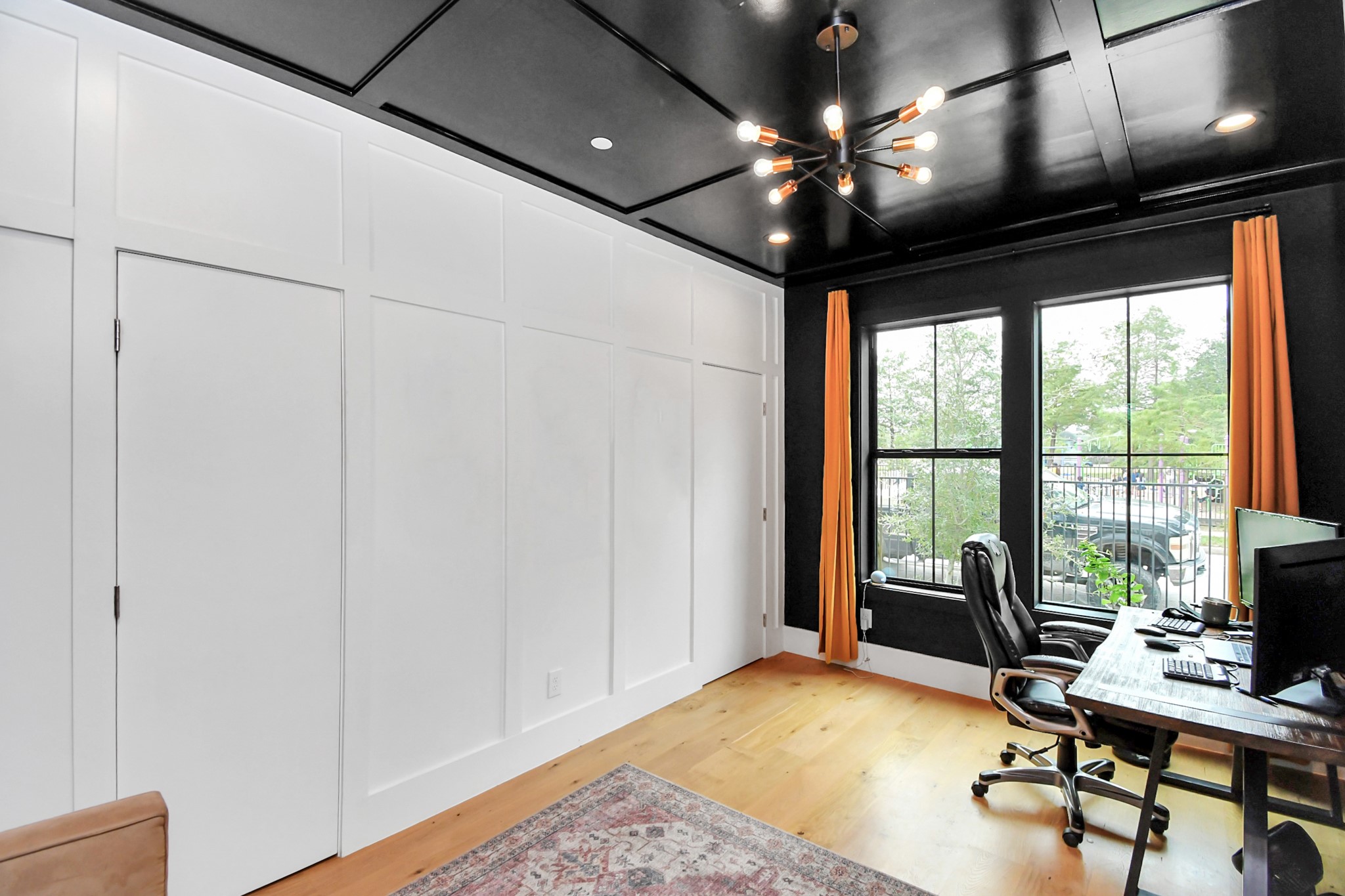2303 Yupon Street Houston, TX 77006 - Photo 10 of 48 a view of a livingroom with workspace and a window