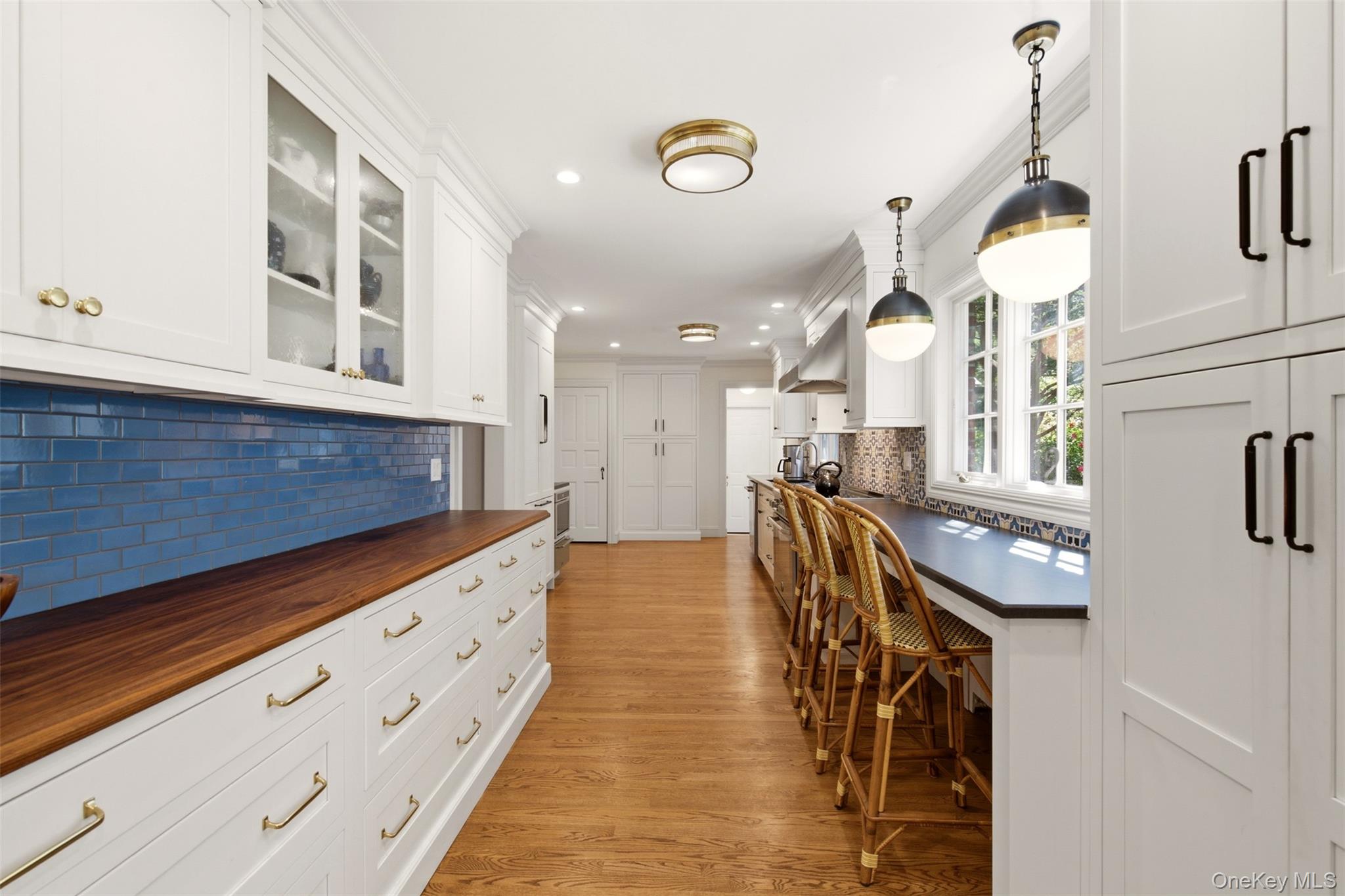 2 St Marks Place Cold Spring Harbor, NY 11724 - Photo 10 of 30 Kitchen with breakfast bar and Amazonite counters