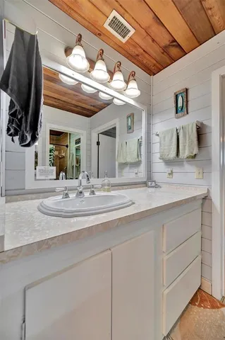 a view of a chairs and table in a patio