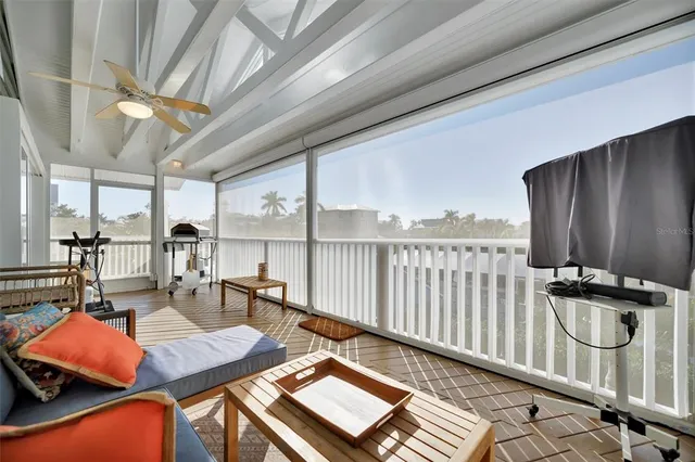 a view of a chairs and table in the patio