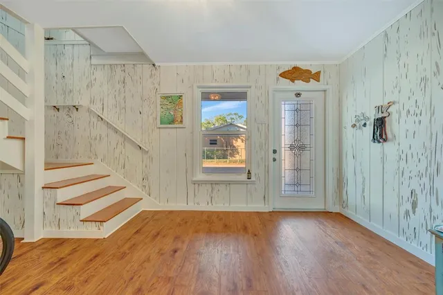 a view of a park with swings and slides