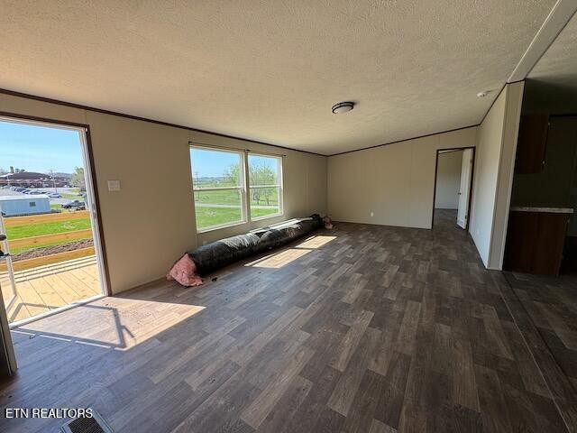 149 Powell Valley School Road Speedwell, TN 37870 - Photo 20 of 30 a view of an empty room with wooden floor and a window