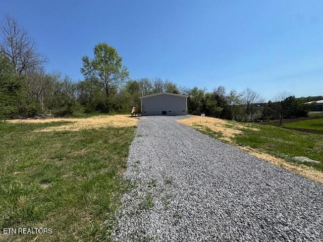 149 Powell Valley School Road Speedwell, TN 37870 - Photo 26 of 30 a pathway of a house with a yard