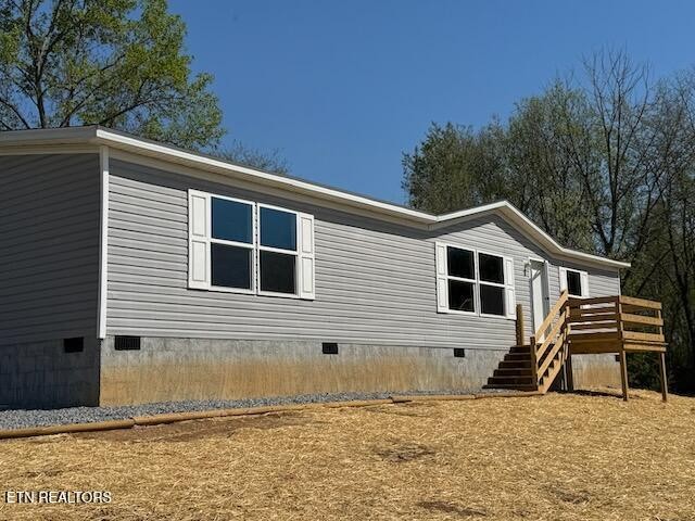 149 Powell Valley School Road Speedwell, TN 37870 - Photo 29 of 30 a view of a house with a backyard