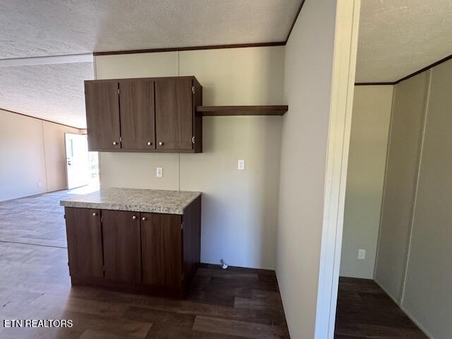 149 Powell Valley School Road Speedwell, TN 37870 - Photo 10 of 30 a kitchen with cabinets and a refrigerator