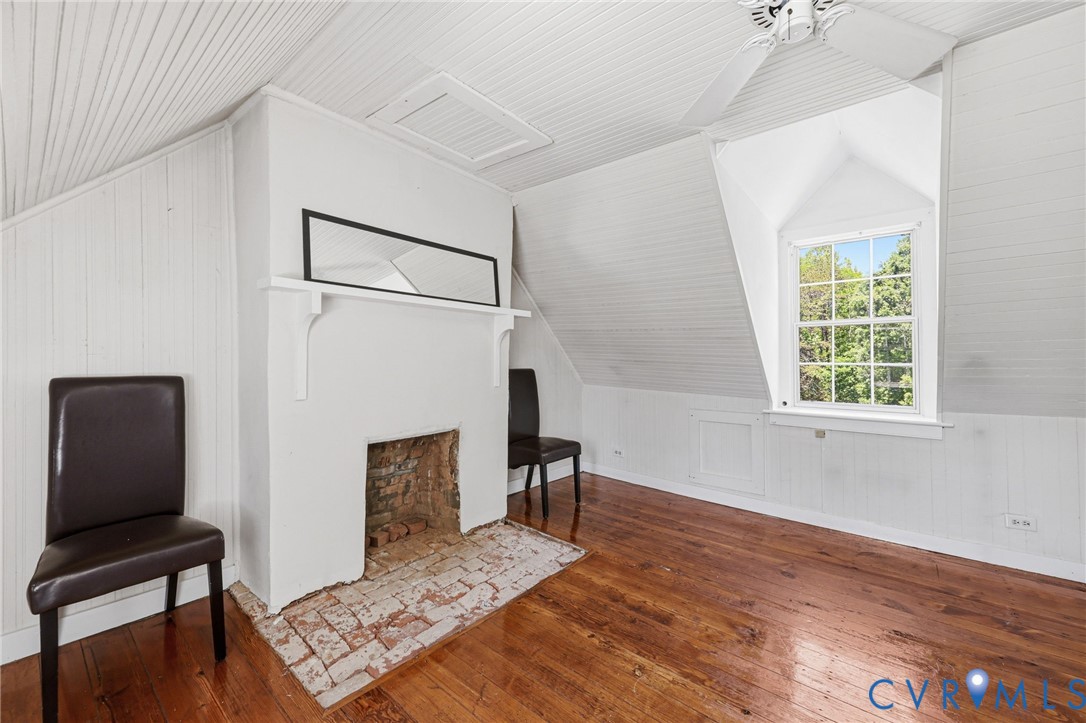 3355 Duke Road Powhatan, VA 23139 - Photo 28 of 67 a workspace with wooden floor and a couch