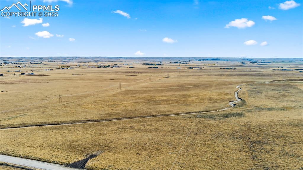 3945 J D Johnson Road Peyton, CO 80831 - Photo 3 of 10 a view of an ocean and beach
