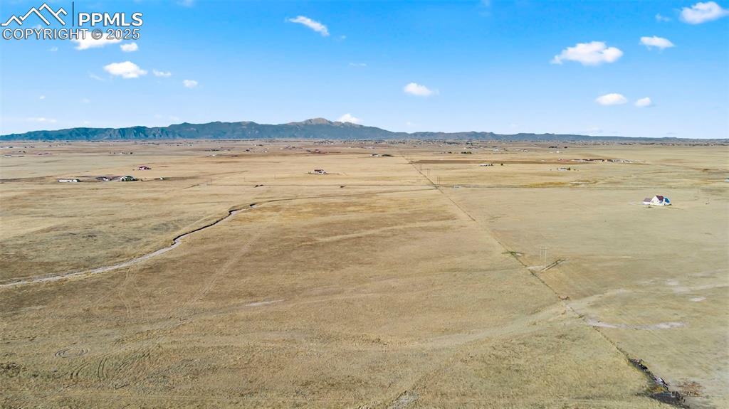 3945 J D Johnson Road Peyton, CO 80831 - Photo 8 of 10 a view of an ocean and beach