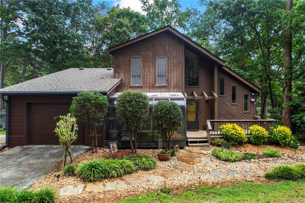 5198 Legendary Tarn Acworth, GA 30102 - Photo 1 of 1 a front view of a house with garden