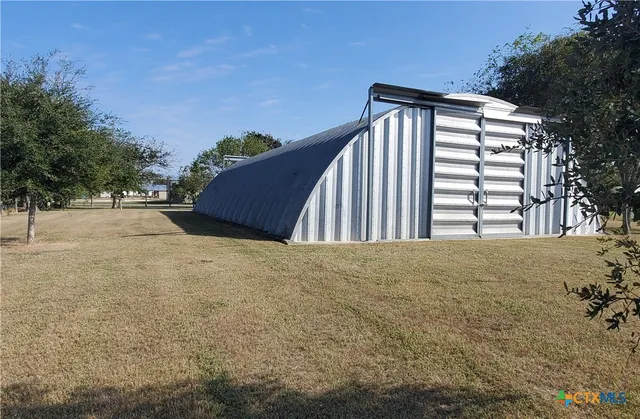 a view of outdoor space and yard