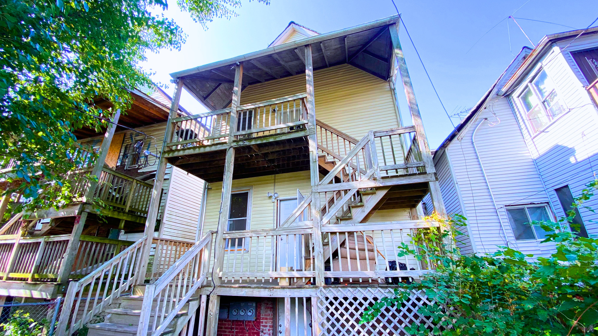 6833 South Green Street Chicago, IL 60621 - Photo 11 of 11 a view of a house with a front door