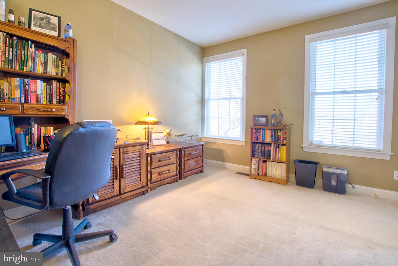 816 Shadebrush Ridge Road West Chester, PA 19382 - Photo 11 of 44 a room with furniture and a book shelf