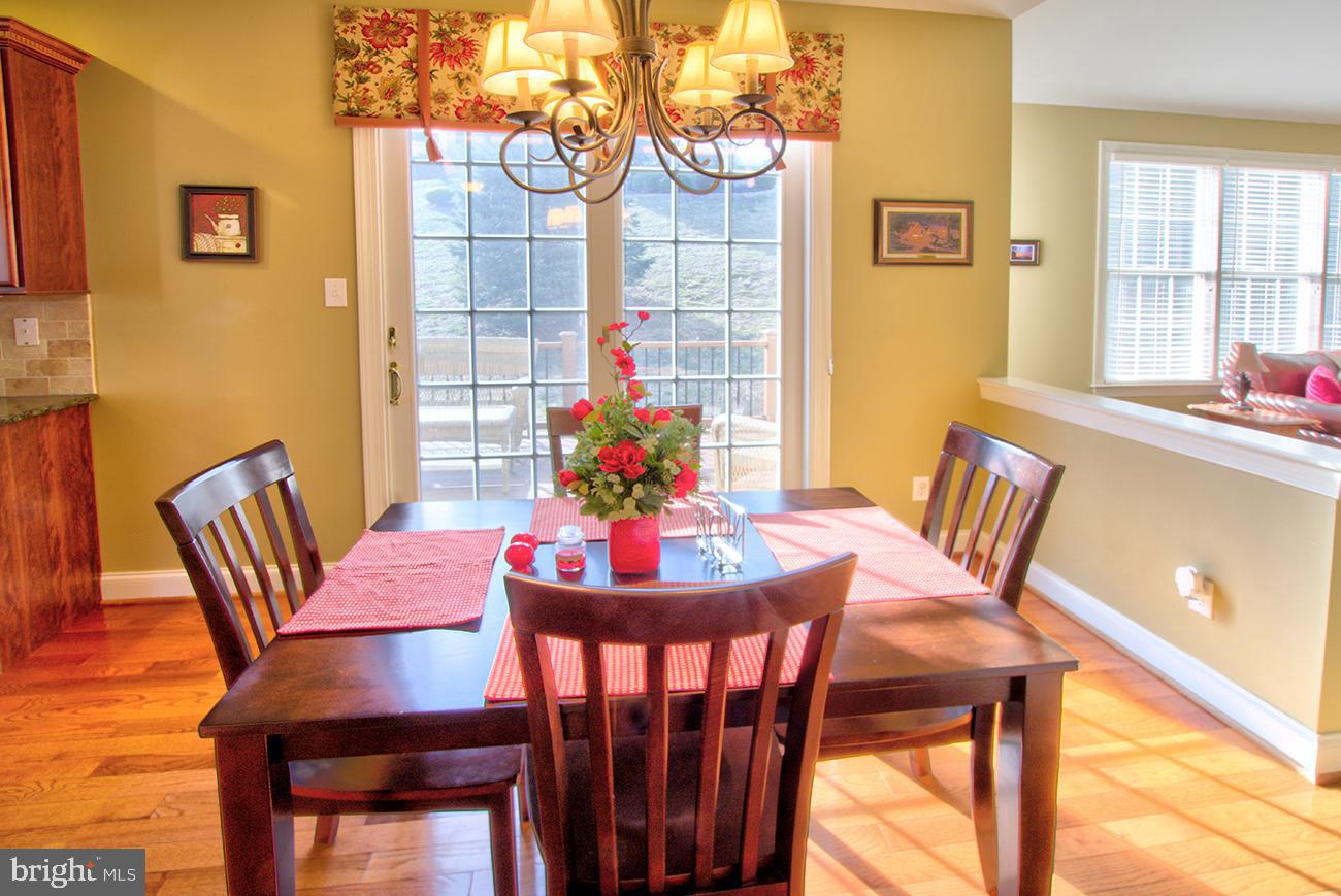 816 Shadebrush Ridge Road West Chester, PA 19382 - Photo 21 of 44 a view of a dining room with furniture and window