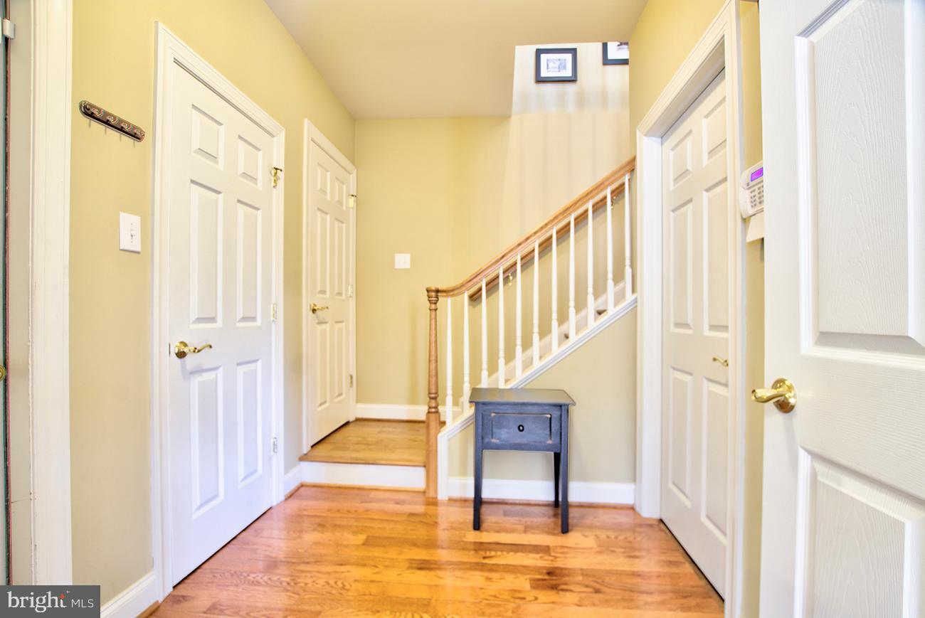 816 Shadebrush Ridge Road West Chester, PA 19382 - Photo 25 of 44 a view of a hallway with wooden floor and staircase