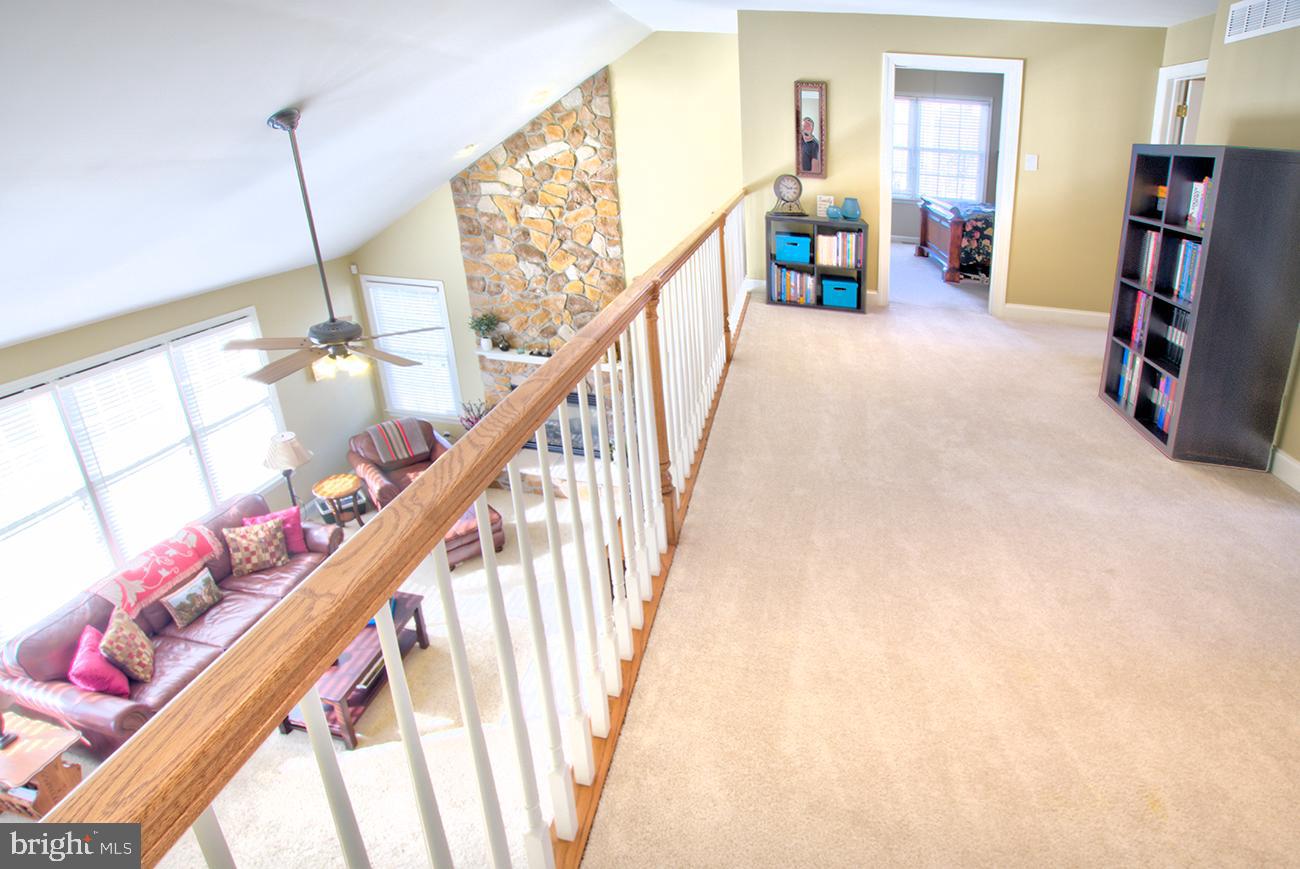 816 Shadebrush Ridge Road West Chester, PA 19382 - Photo 35 of 44 a view of a hallway with furniture and wooden floor