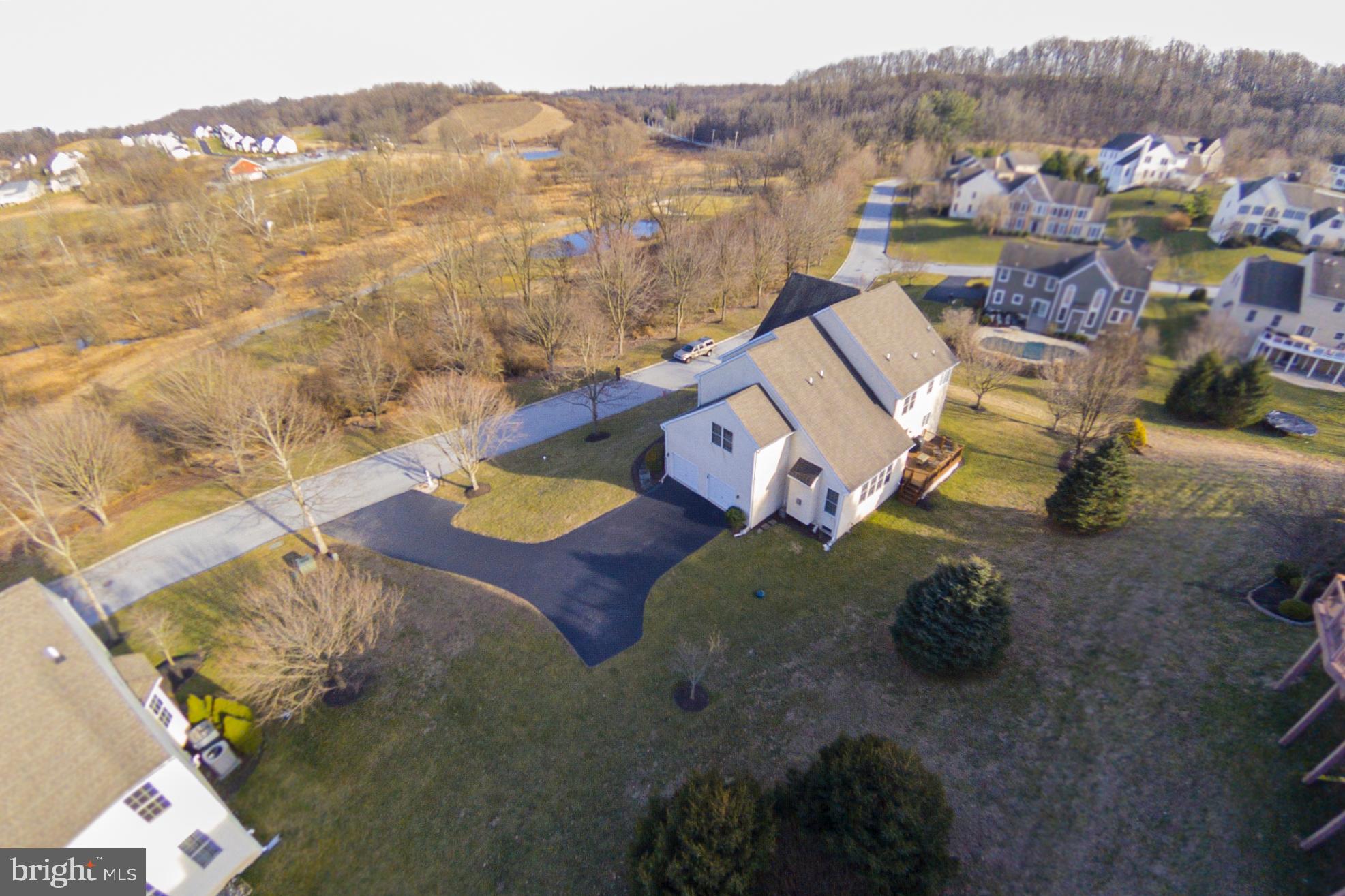 816 Shadebrush Ridge Road West Chester, PA 19382 - Photo 42 of 44 an aerial view of a house with a yard