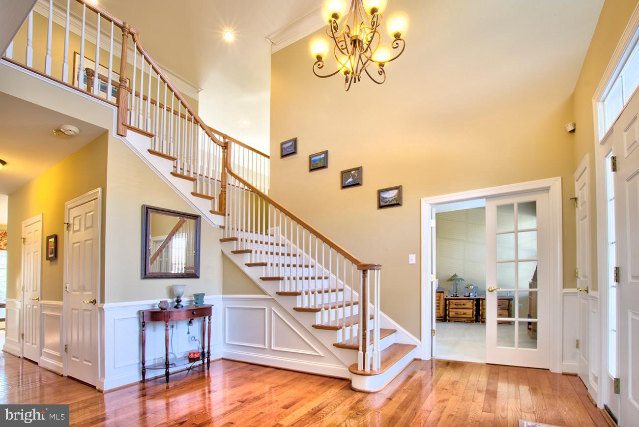 816 Shadebrush Ridge Road West Chester, PA 19382 - Photo 10 of 44 a view of a livingroom with wooden floor and stairs