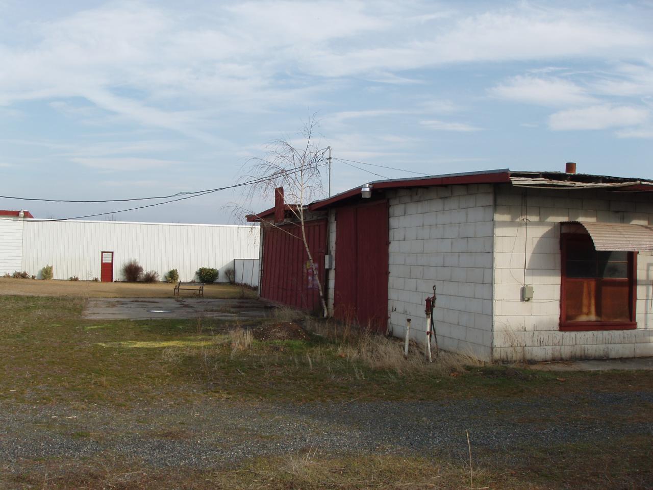 5543 Lateral A Road Wapato, WA 98951 - Photo 18 of 19 a view of a house with a yard