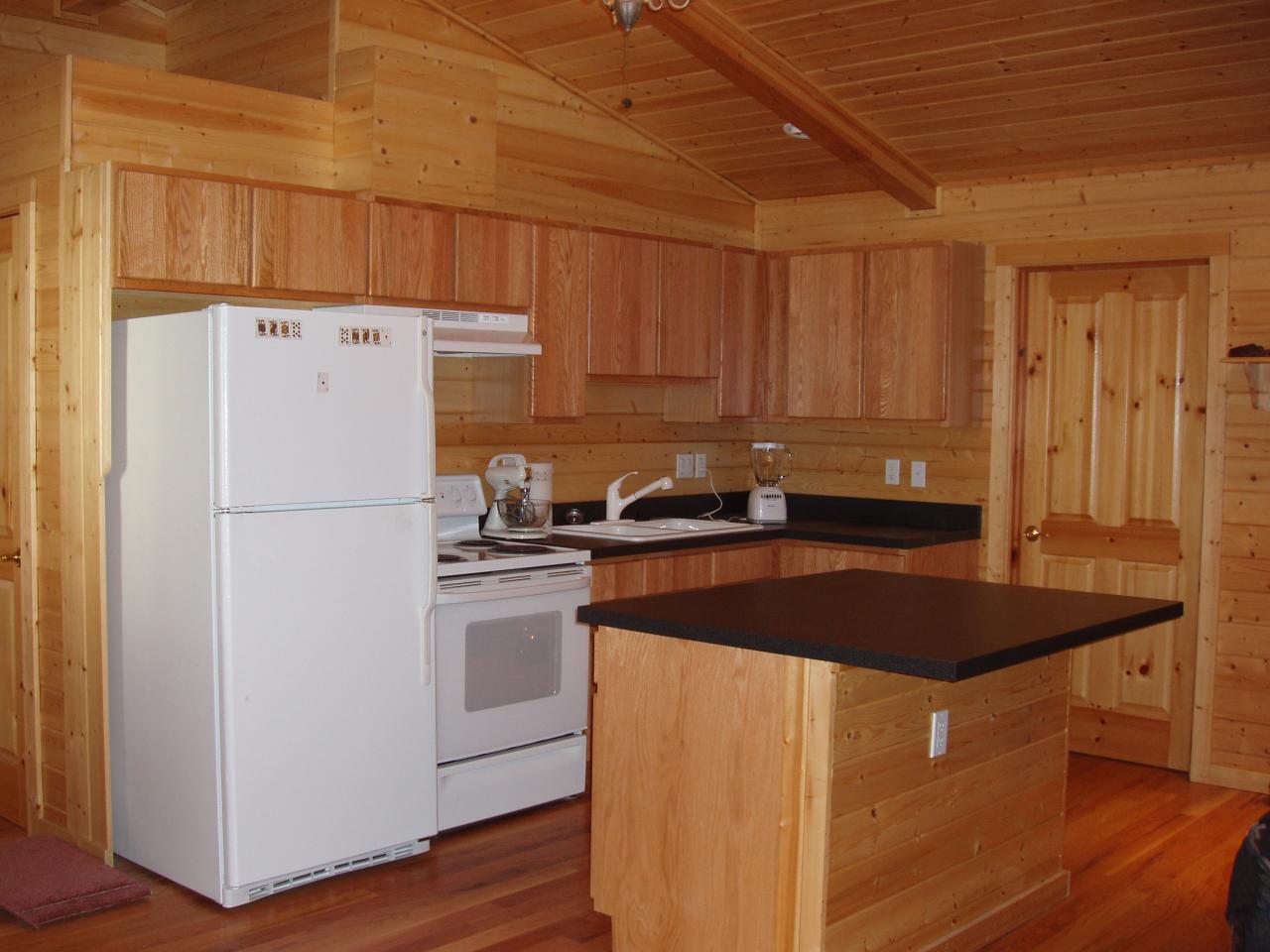 5543 Lateral A Road Wapato, WA 98951 - Photo 8 of 19 a kitchen with a refrigerator and a sink