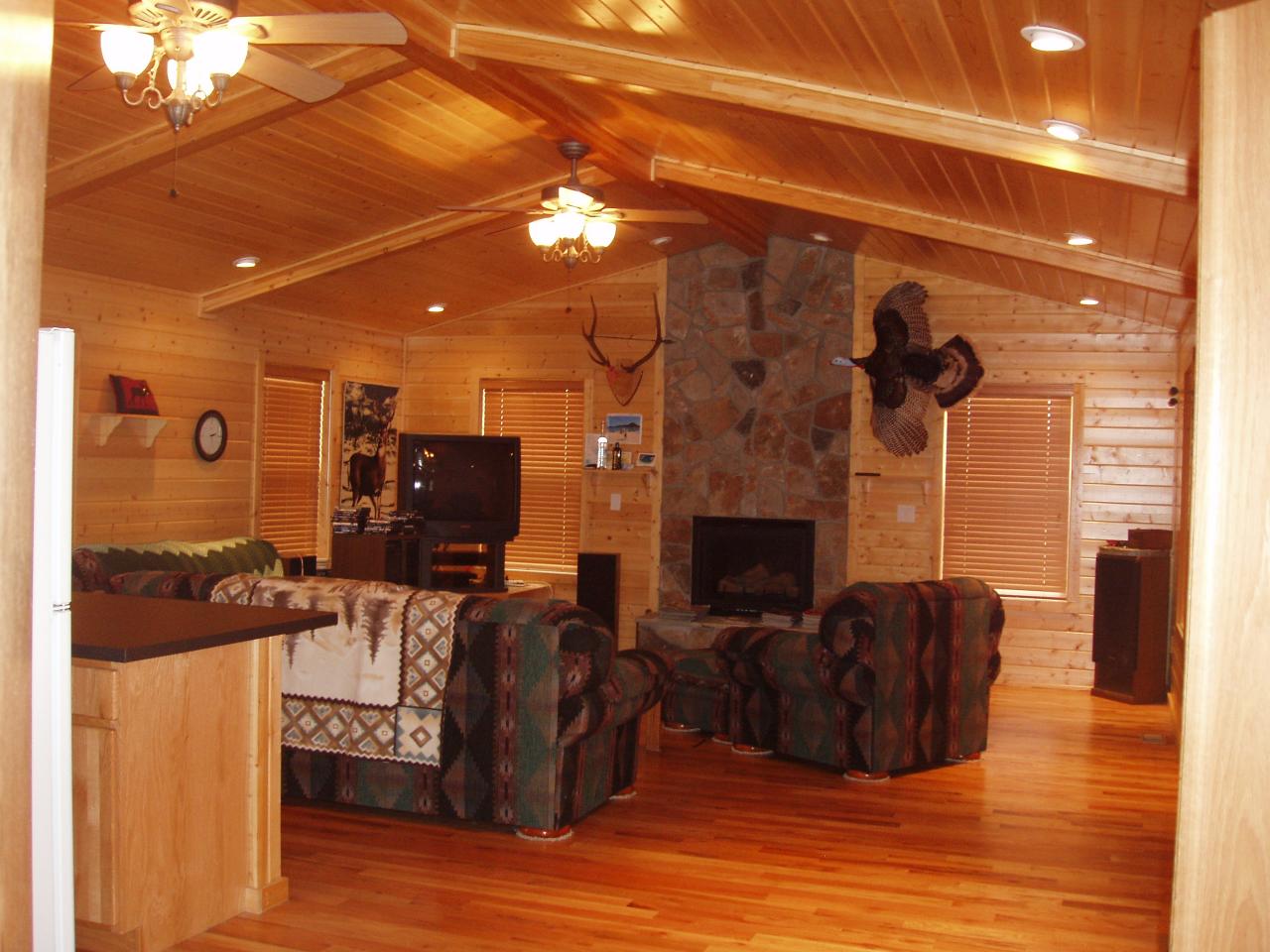 5543 Lateral A Road Wapato, WA 98951 - Photo 9 of 19 a living room with furniture a fireplace and a flat screen tv