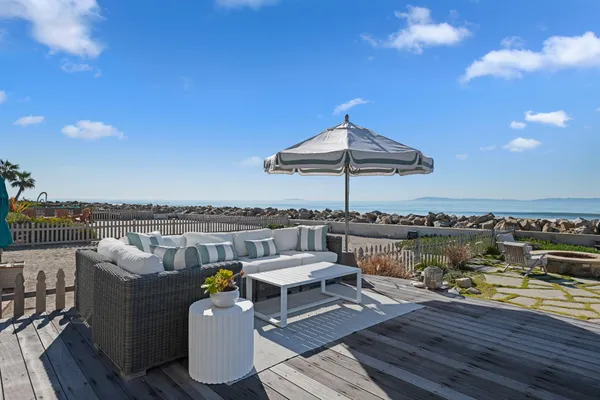 a view of a terrace with seating area