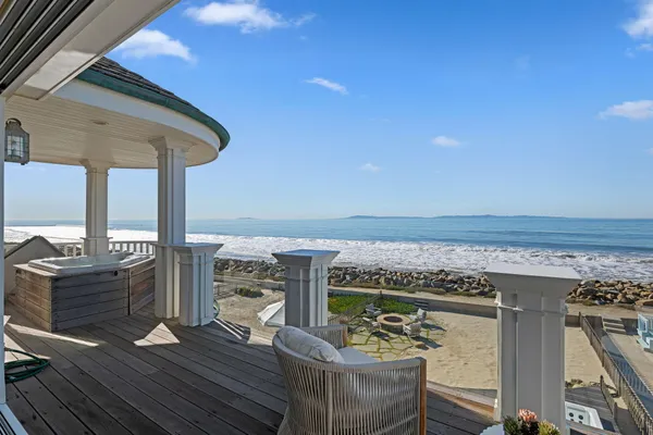 a terrace with a table and chairs