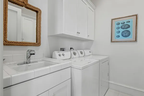 a utility room with a sink