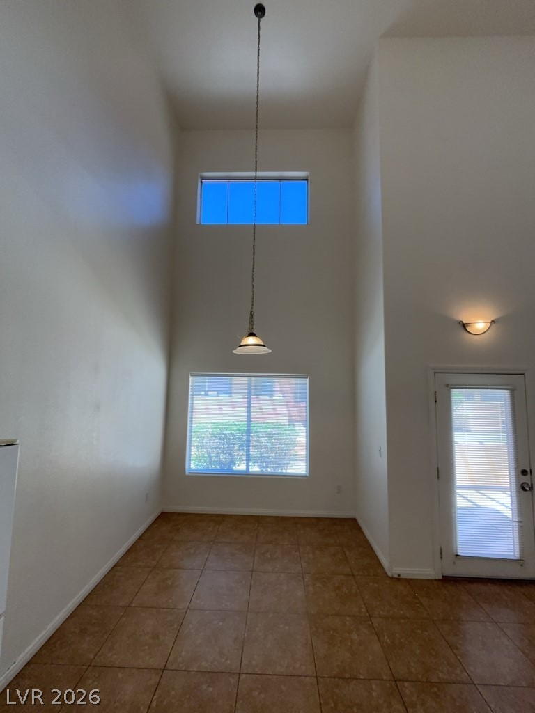 4915 East Russell Road, Unit 180 Las Vegas, NV 89120 - Photo 3 of 8 This airy space features soaring ceilings and natural light, creating an inviting ambiance for daily living.
