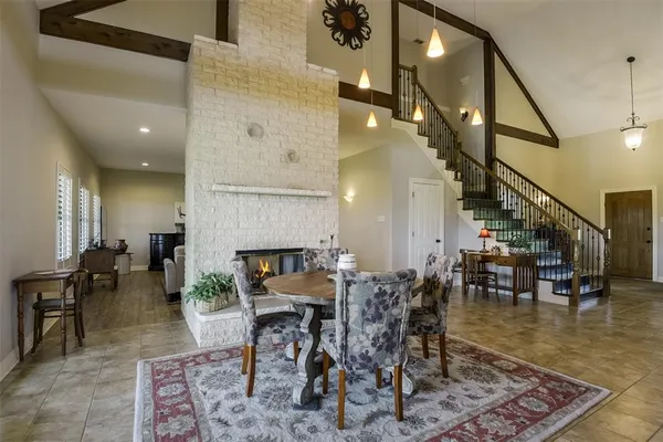 a dining room with lots of tables and chairs