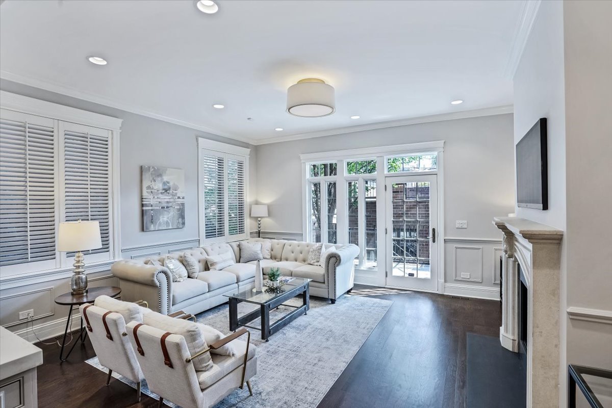 1445 West Wolfram Street Chicago, IL 60657 - Photo 21 of 69 a living room with furniture and a fireplace