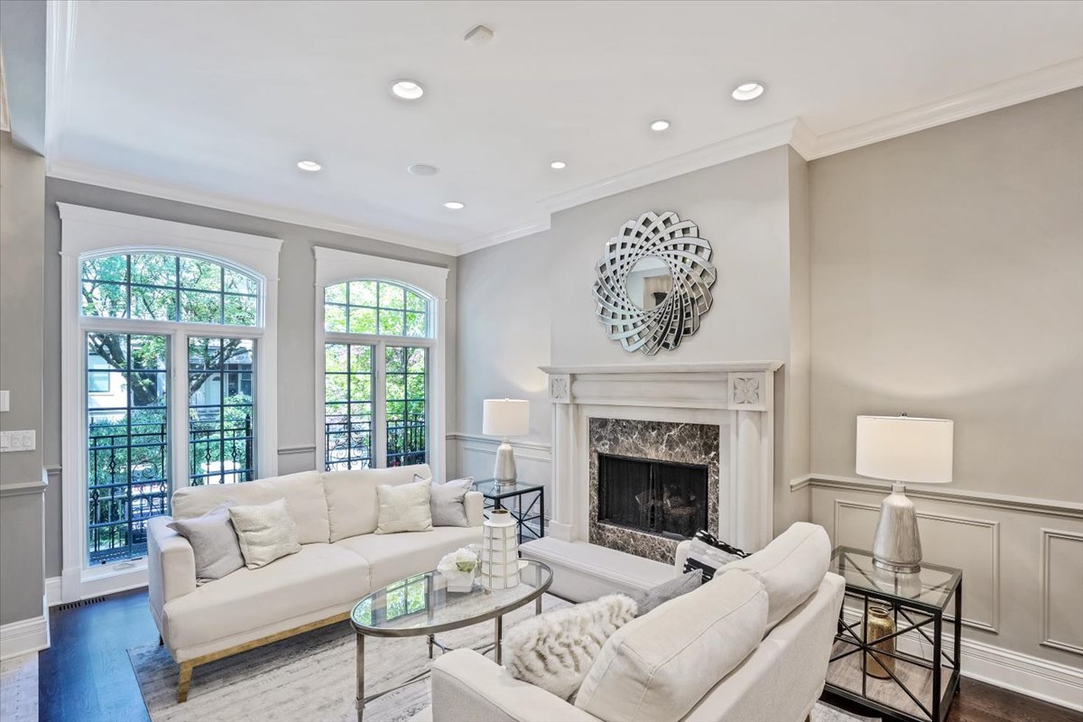 1445 West Wolfram Street Chicago, IL 60657 - Photo 5 of 69 a living room with furniture and a fireplace