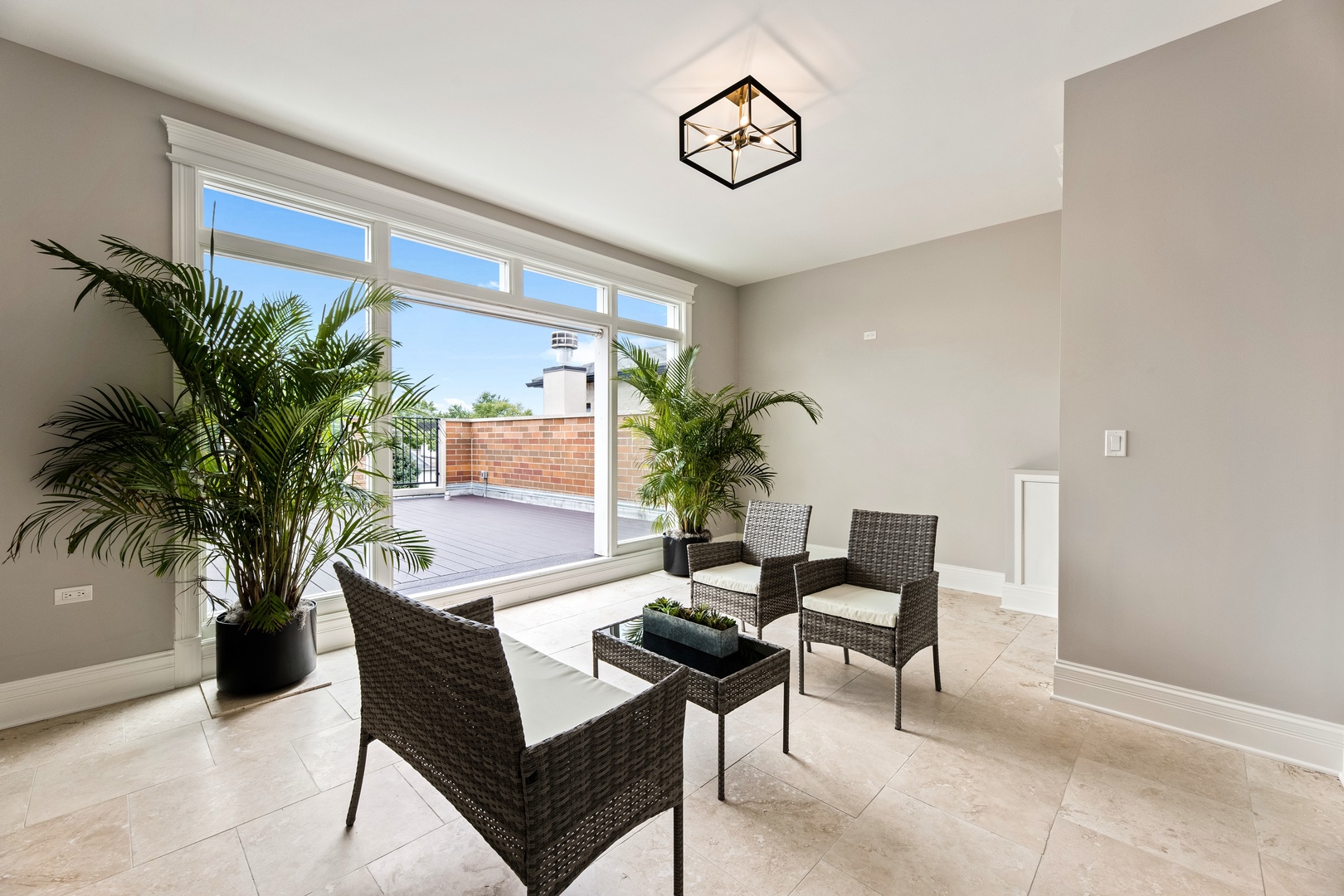 1445 West Wolfram Street Chicago, IL 60657 - Photo 44 of 69 a dining room with furniture and a potted plant