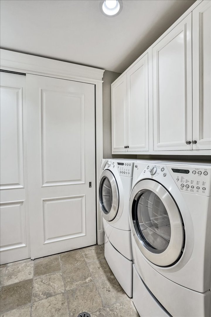 1445 West Wolfram Street Chicago, IL 60657 - Photo 62 of 69 a utility room with sink dryer and washer