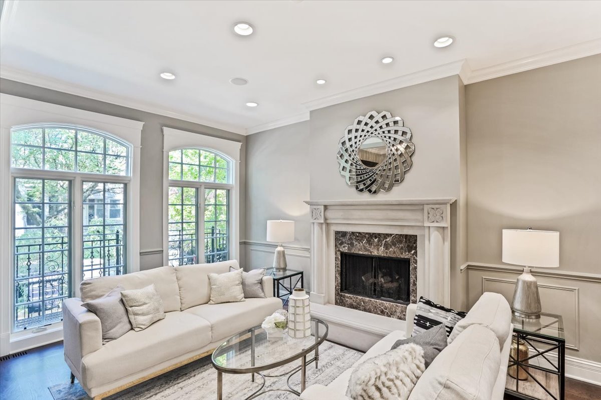 1445 West Wolfram Street Chicago, IL 60657 - Photo 8 of 69 a living room with furniture a fireplace and a large window