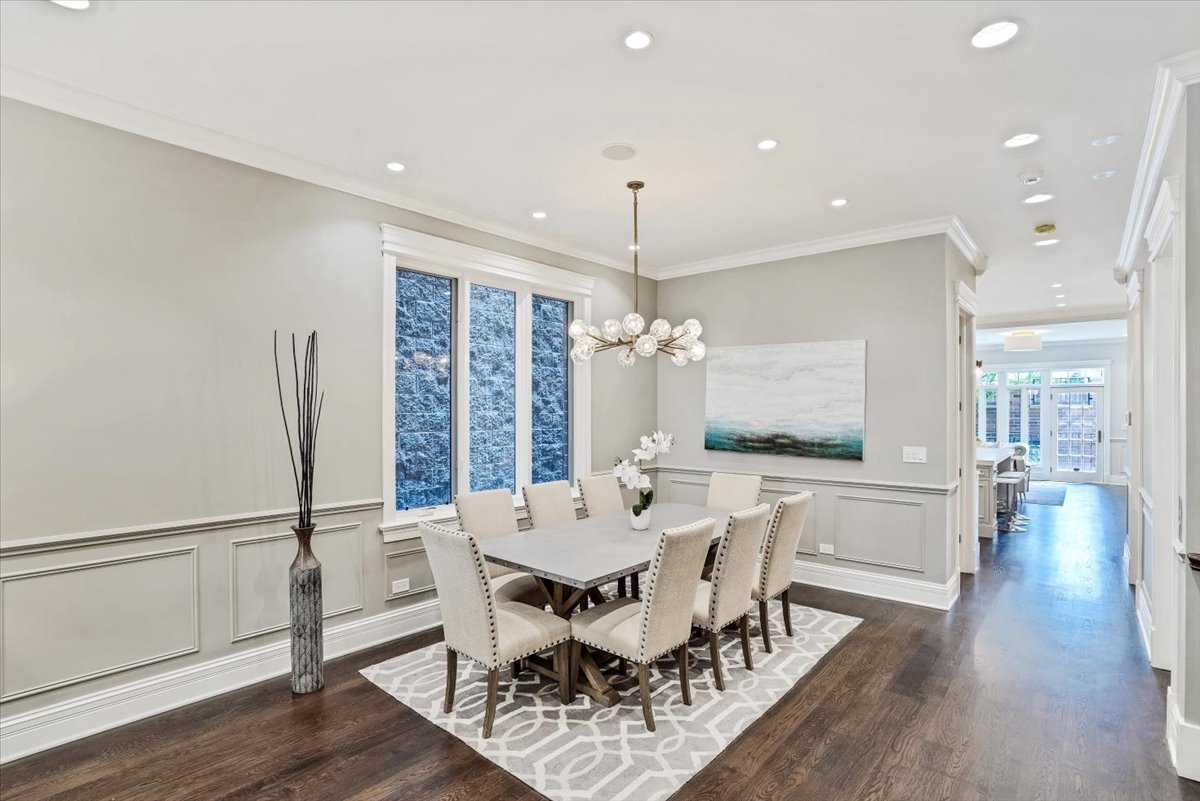 1445 West Wolfram Street Chicago, IL 60657 - Photo 10 of 69 a view of a dining room with furniture window and wooden floor