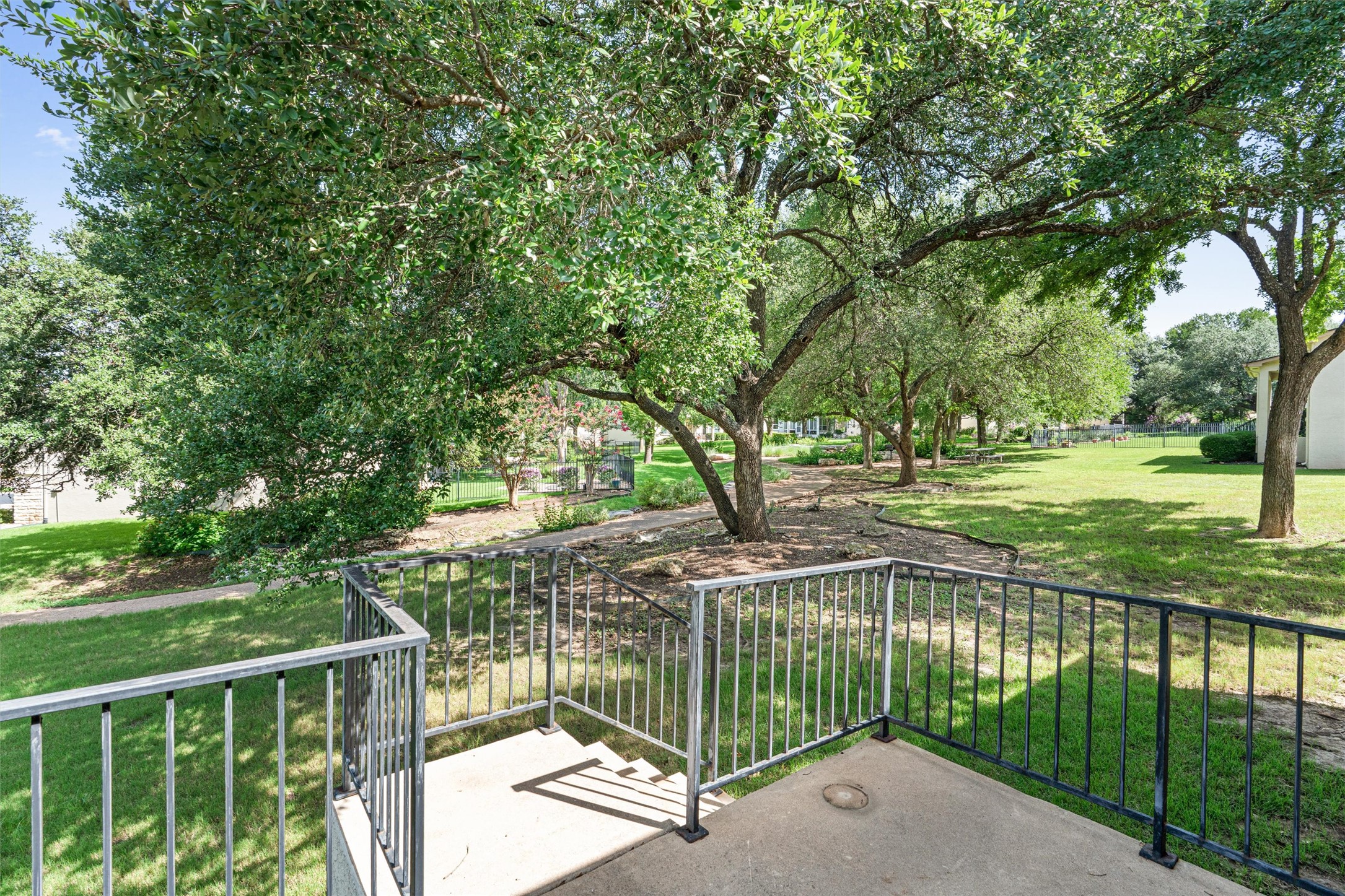 121 Larkspur Lane Georgetown, TX 78633 - Photo 1 of 28 a view of a fence and trees in the background