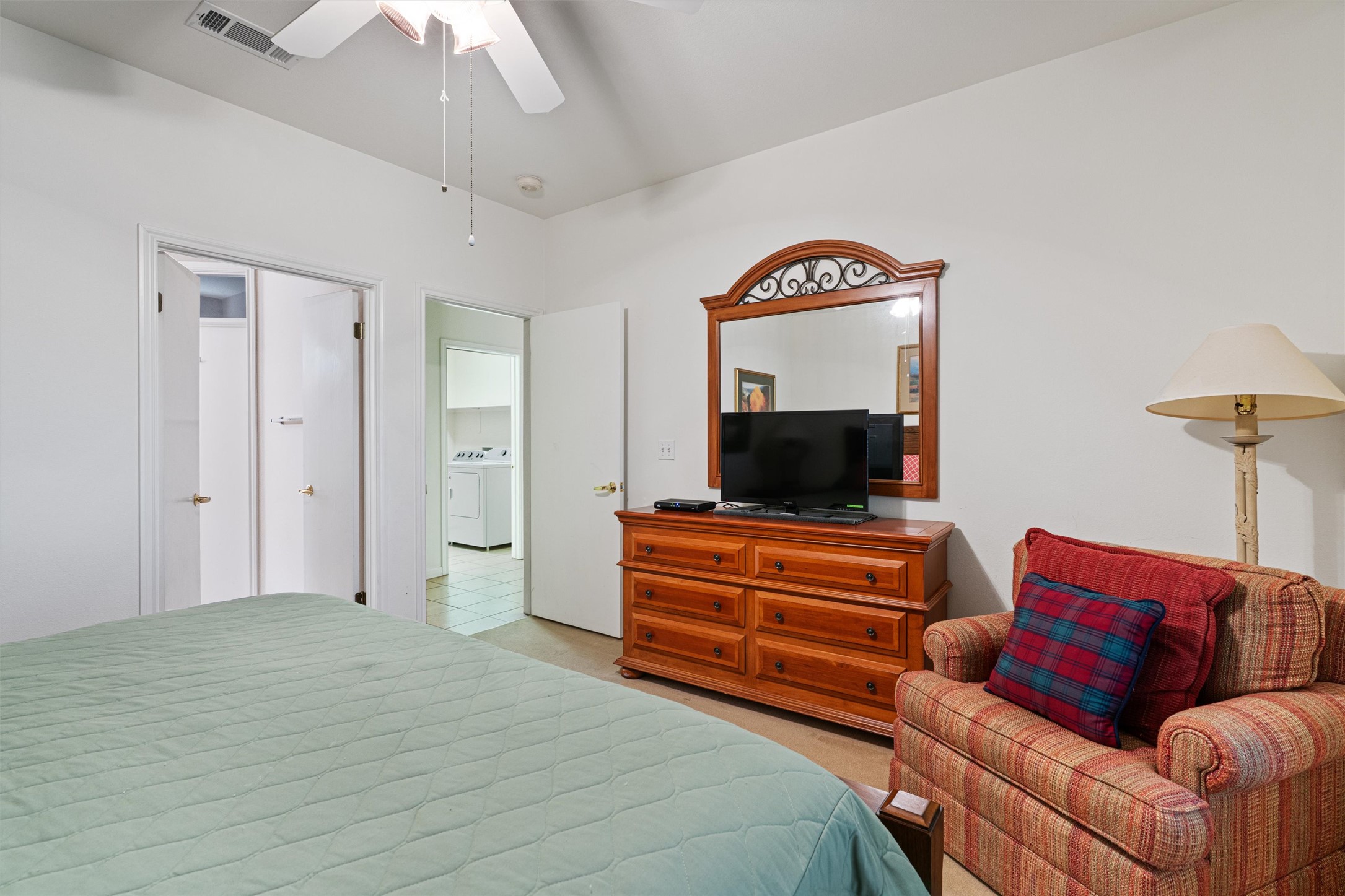 121 Larkspur Lane Georgetown, TX 78633 - Photo 14 of 28 a bedroom with furniture and a flat screen tv