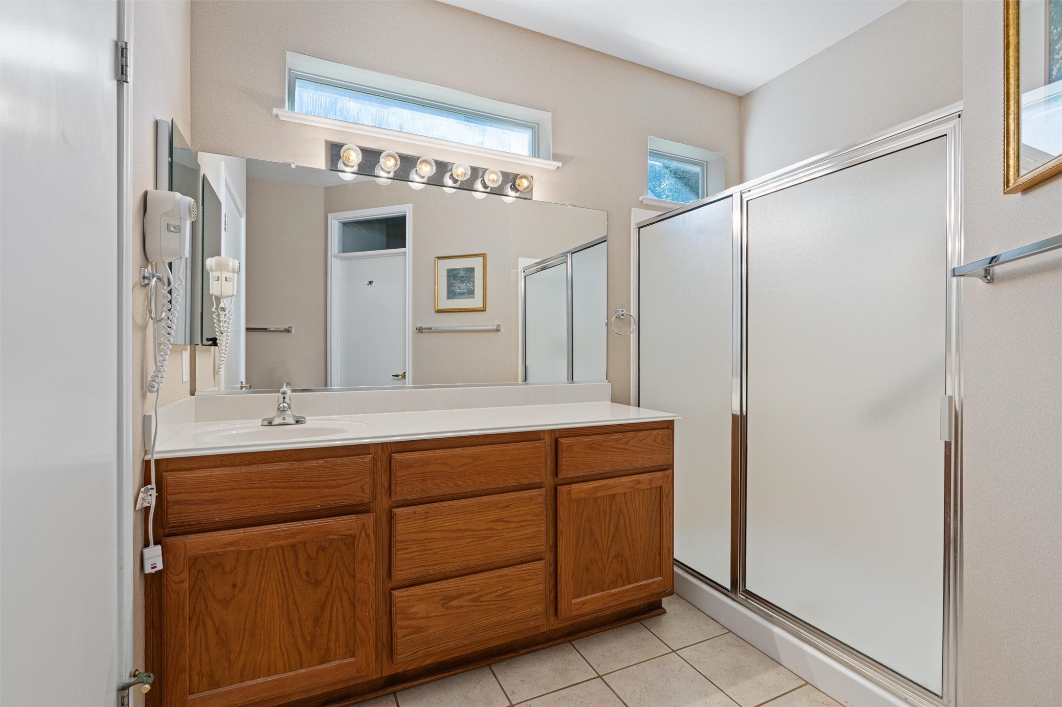 121 Larkspur Lane Georgetown, TX 78633 - Photo 15 of 28 a bathroom with a double vanity sink and mirror